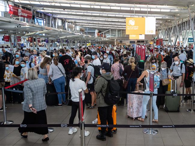 11th April 2022. The DailyTelegraph. NewsKingsford Smith Airport, Sydney , NSW.Pics by Julian Andrews.Generic pictures showing the long queues and mild chaos at Sydney Airport's T2 Domestic Terminal this morning.