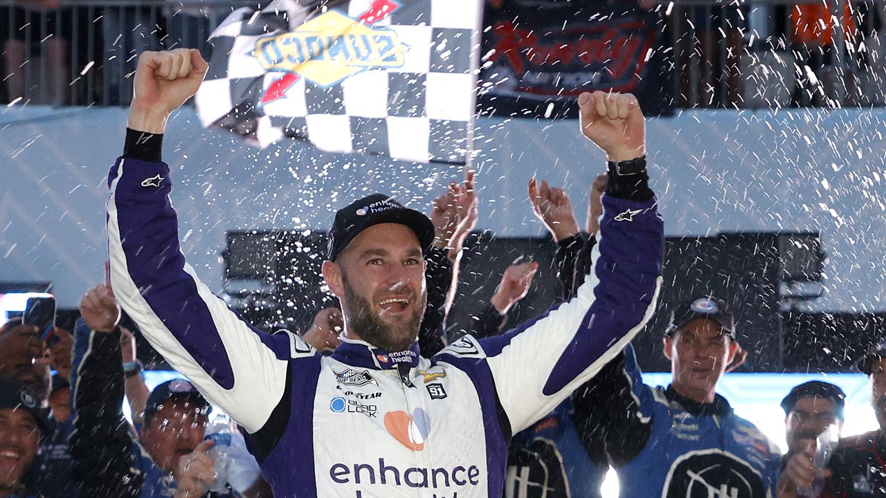 Shane Van Gisbergen celebrates winning his debut NASCAR race. Picture: Chris Graythen / GETTY IMAGES NORTH AMERICA / Getty Images via AFP