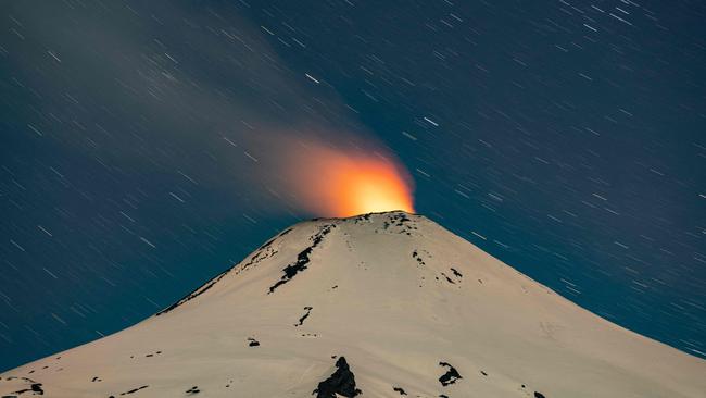 The Villarrica volcano shows signs of activity, as seen from Pucon, some 800km south of Santiago. Picture: AFP