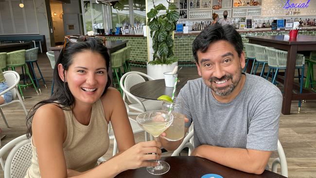 Crystal Mitsutsune and Luis Olivares from Sydney enjoy their drink at Boardwalk Social. Picture: Andreas Nicola