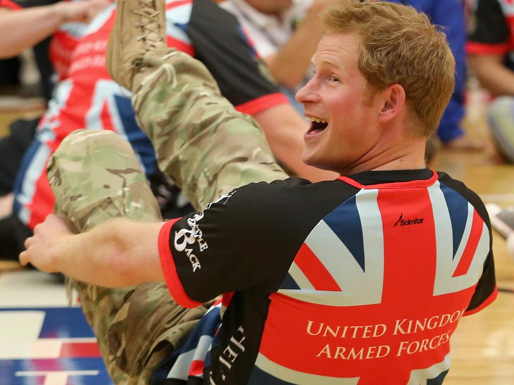 Prince Harry plays for the UK team against the USA during a seated volleyball exhibition match during the Warrior Games in 2013 in Colorado Springs. Picture: Chris Jackson/Getty Images