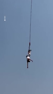 Horror moment tourist's bungee cord snaps