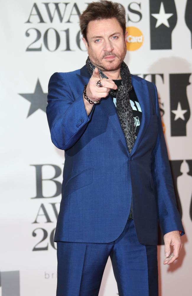 Feeling blue? ... Simon Le Bon poses for photographers. Picture: Joel Ryan/Invision/AP