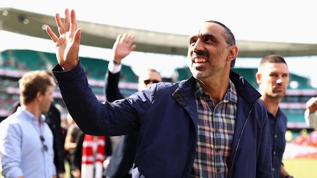 Eddie Betts has the highest admiration for Adam Goodes, seen here walking a lap of honour with teammates from the 2012 premiership-winning Sydney team at the SCG in 2022. Picture: Cameron Spencer/Getty