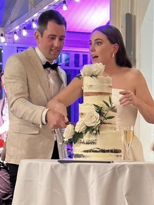 Newlyweds Mitchell and Madeline Gaffney during their ceremony.