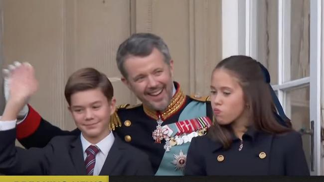 The royal kids had a laugh on the balcony.