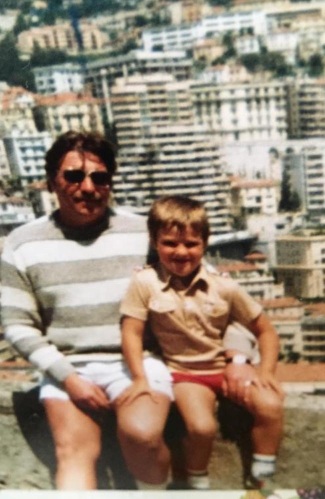 A young Kris Smith with his dad Eddie. Picture: Supplied