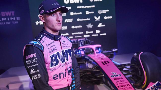 Alpine's Australian driver Jack Doohan is pictured by the team's A525 Formula One racing car during the BWT Alpine F1 Team's 2025 season launch, in London on February 18, 2025. (Photo by BENJAMIN CREMEL / AFP)