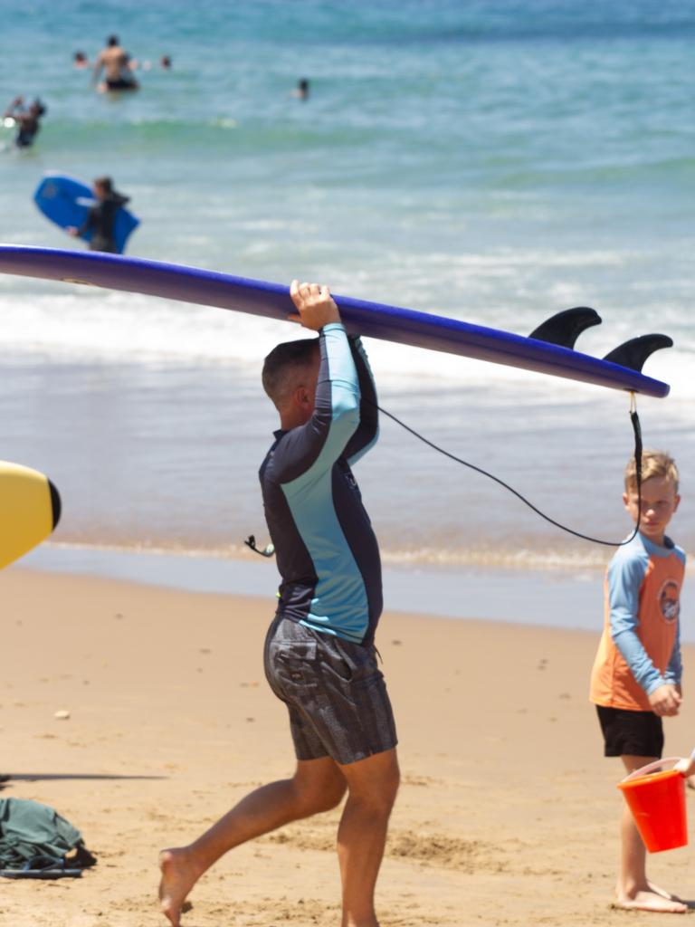 Beachgoers made the most of the waves.