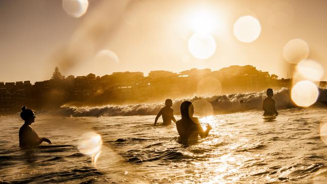 Swimmers enjoy Bondi Beach on Wednesday in preparation for a warm Sydney day. Picture: Getty Images