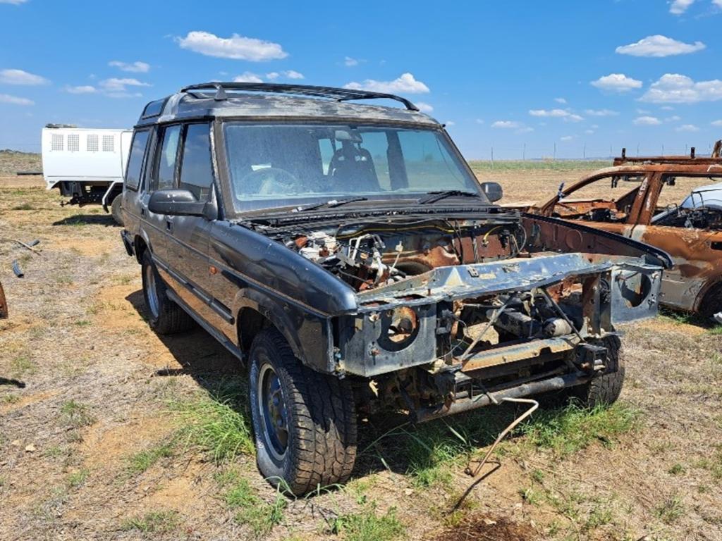 Unregistered, five door, green Land Rover Discovery.