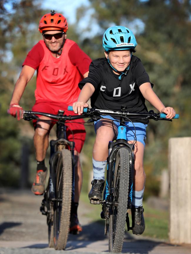 Daniel Wade and his son Jensen, 10, on their bikes at Byethorne Park, Nairne. Picture: Dean Martin