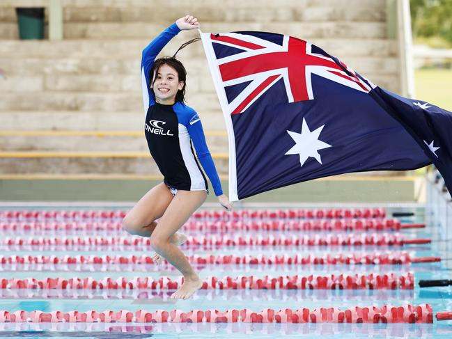 Hannah Yet Foy, 10, celebrates Australia Day while cooling off at the Woree swimming pool. Picture: Brendan Radke