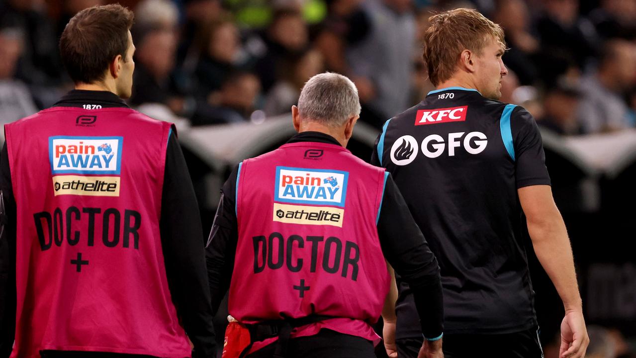 Ollie Wines leaves Thursday night’s match. Picture: James Elsby/AFL Photos via Getty Images