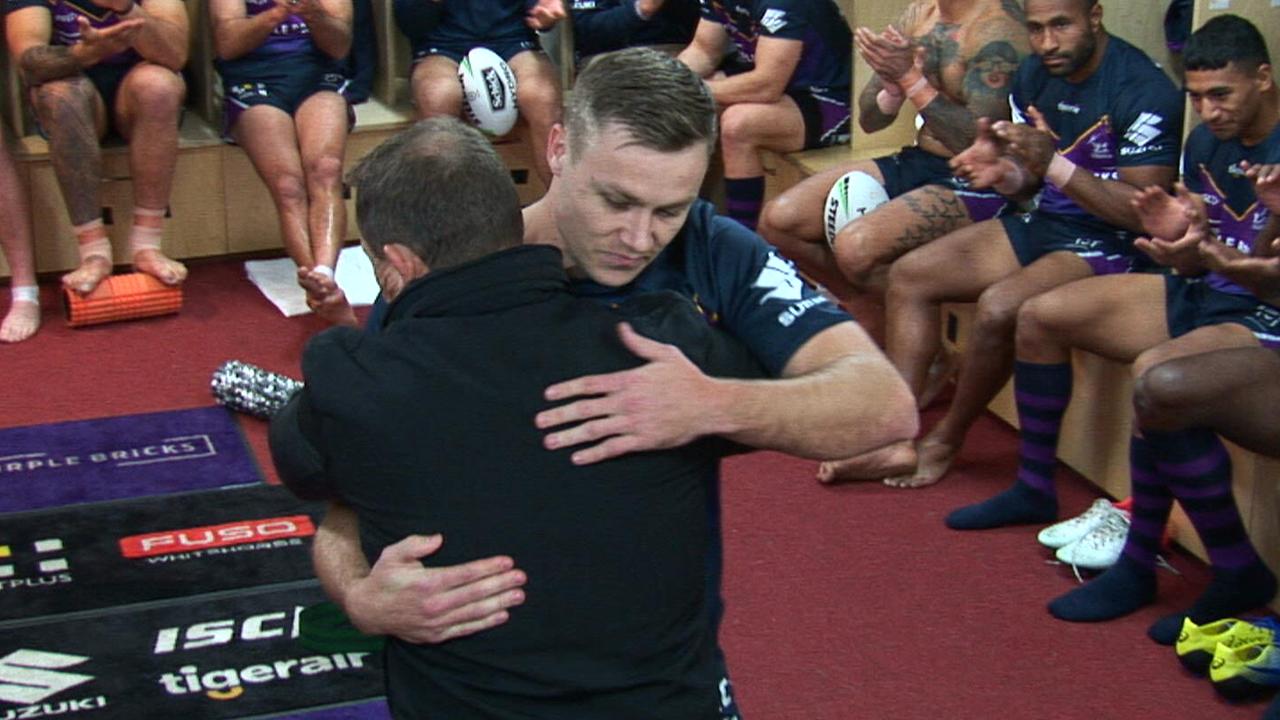 Billy Walters is presented with his NRL jersey by his dad Kevin.