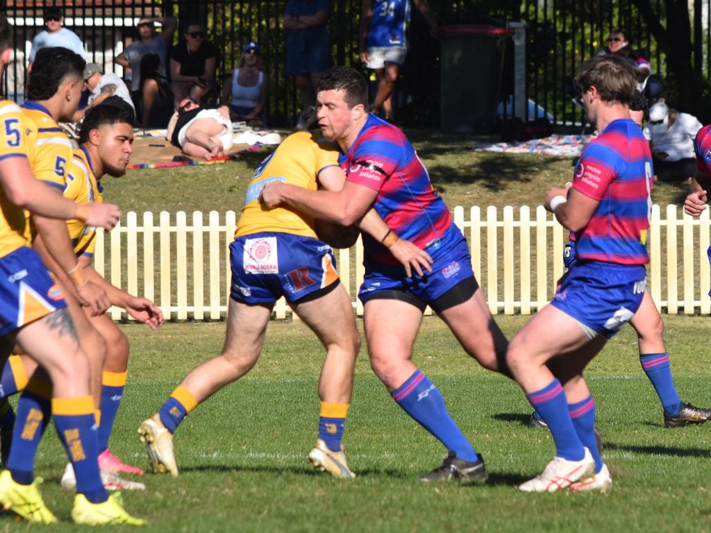 Riley Lord is tackled by Ryan O'Connor. Picture: Sean Teuma