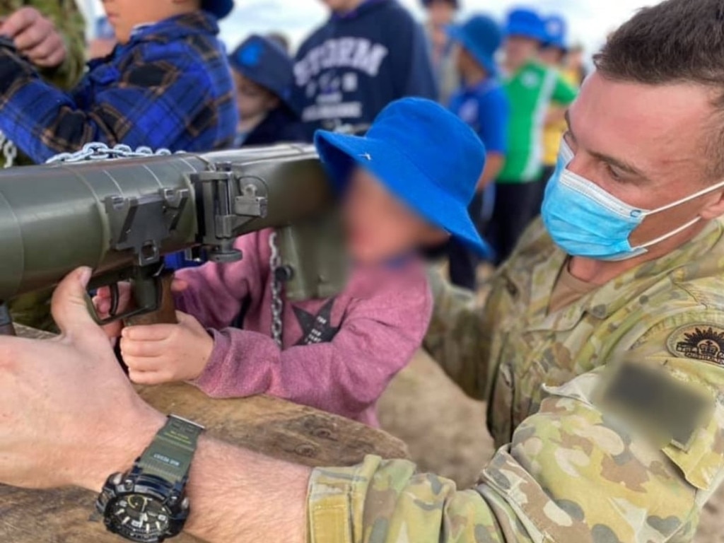 Children as young as six were allowed to play with the weapons during an Army visit. Picture: Supplied