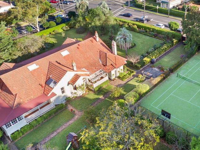 This corner block estate in Cheltenham is for sale.