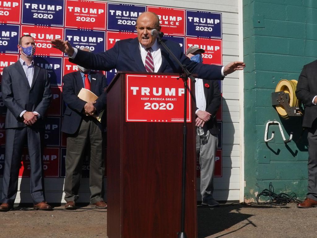 Rudy pictured speaking at the Four Seasons Total Landscaping – not the fancy hotel everyone expected. Picture: Bryan R. Smith / AFP