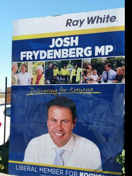 Ray White’s logo on a billboard for Josh Frydenberg.