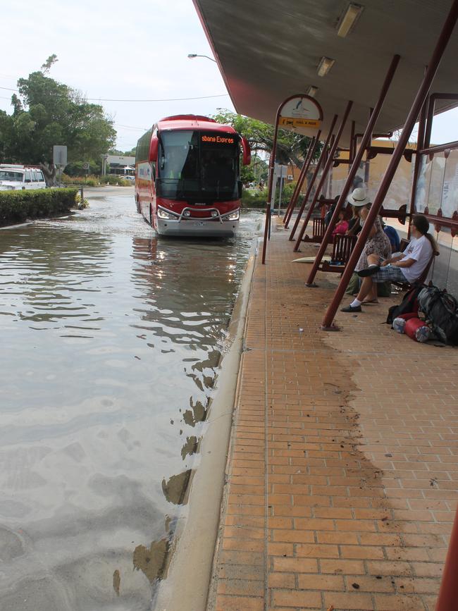 BUS MOORING: The Tamar St bus interchange in Ballina looked more like a wharf with a king tide which peaked at 9.49am at 2m.Photo Graham Broadhead / Ballina Shire Advocate