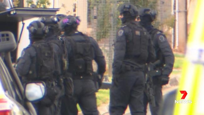 Heavily armed specialist police called in for the operation. Picture: 7NEWS