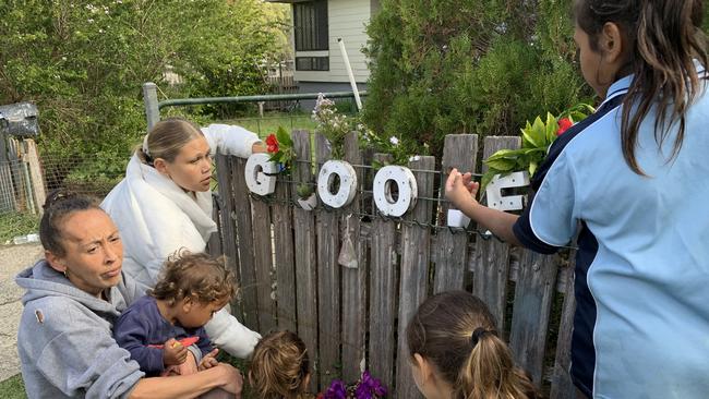 Jessica Howard with Lakeesha and her brothers and sisters at the memorial to David in South Kempsey. Picture: Janine Watson