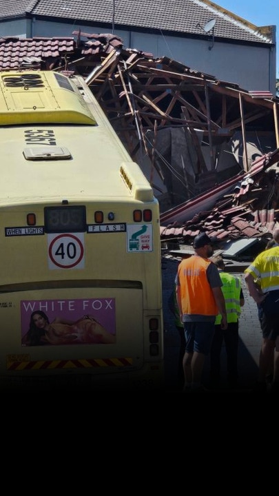 Bus crashes into suburban Sydney home