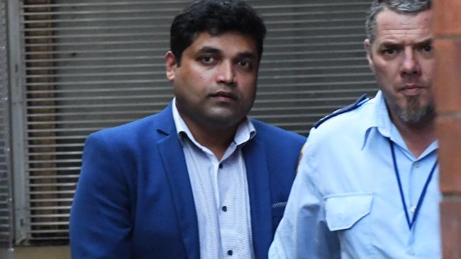 Shahab Ahmed is taken from the NSW Supreme Court today. Picture: AAP