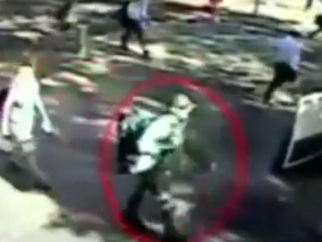 New CCTV angles show Man Monis walking to the Lindt Cafe. Picture: 7 News Sydney