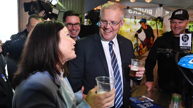 Prime Minister Scott Morrison and his wife Jenny enjoy a beer at Agfest on Thursday. Picture: AAP