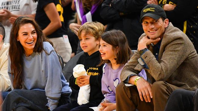 LOS ANGELES, CA - MAY 24: Actors Mila Kunis and Ashton Kutcher and their children look on during the WNBA basketball game between the Indiana Fever and the Los Angeles Sparks on May 24, 2024, at Crypto.com Arena in Los Angeles, CA.(Photo by Brian Rothmuller/Icon Sportswire via Getty Images)