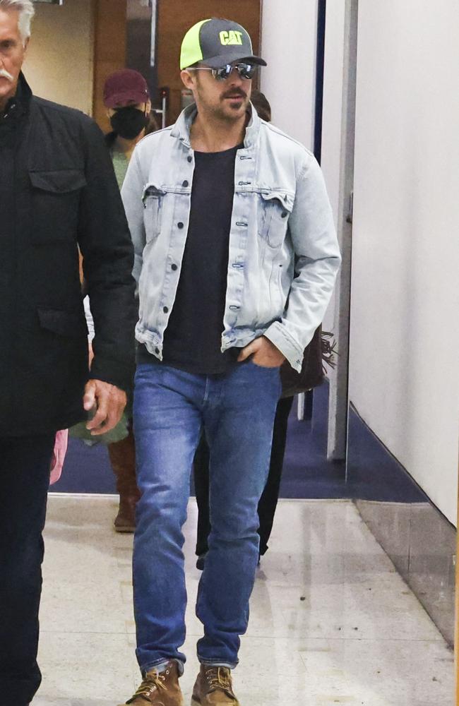 Ryan Gosling walks through Sydney Airport. Pictures: Media Mode