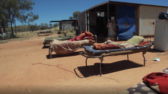 Residents at White Gate, a camp outside of Alice Springs, are forced to sleep outside due to living conditions in the small tin sheds they call home. Picture: Supplied