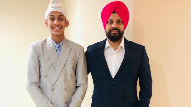 Jatinder Virk (right) alongside 14-year-old son Navraj Singh who was struck by a car crossing the road in Thornlands on October 12.