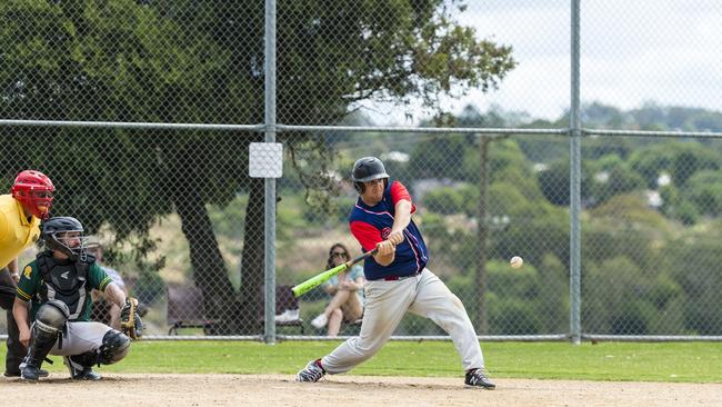 Brent Vanderneut hits for Toowoomba Rangers. Photo: Kevin Farmer