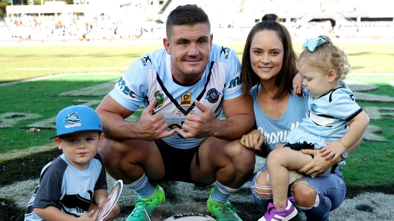 Shark's Chris Heighington with his family after his 300th during NRL game. Picture : Gregg Porteous