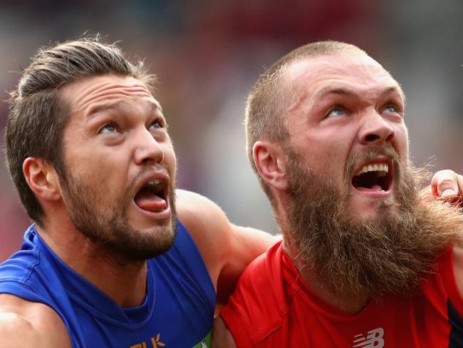 MELBOURNE, AUSTRALIA - MAY 22: Stefan Martin of the Lions and Max Gawn of the Demons compete in the ruck during the round nine AFL match between the Melbourne Demons and the Brisbane Lions at Melbourne Cricket Ground on May 22, 2016 in Melbourne, Australia.  (Photo by Quinn Rooney/Getty Images)