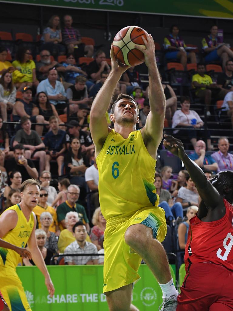 Australia's Mitch Norton goes up