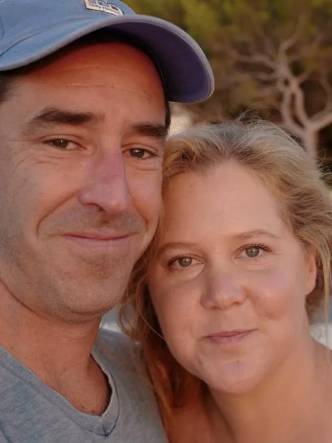 Amy Schumer and husband Chris Fischer.