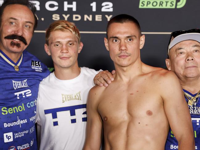 SYDNEY, AUSTRALIA - MARCH 11: Nikita Tszyu (left centre) and brother Tim Tszyu (right centre) pose during the official weigh-in for their super welter weight world title bout on March 11, 2023 in Sydney, Australia. (Photo by Jenny Evans/Getty Images)