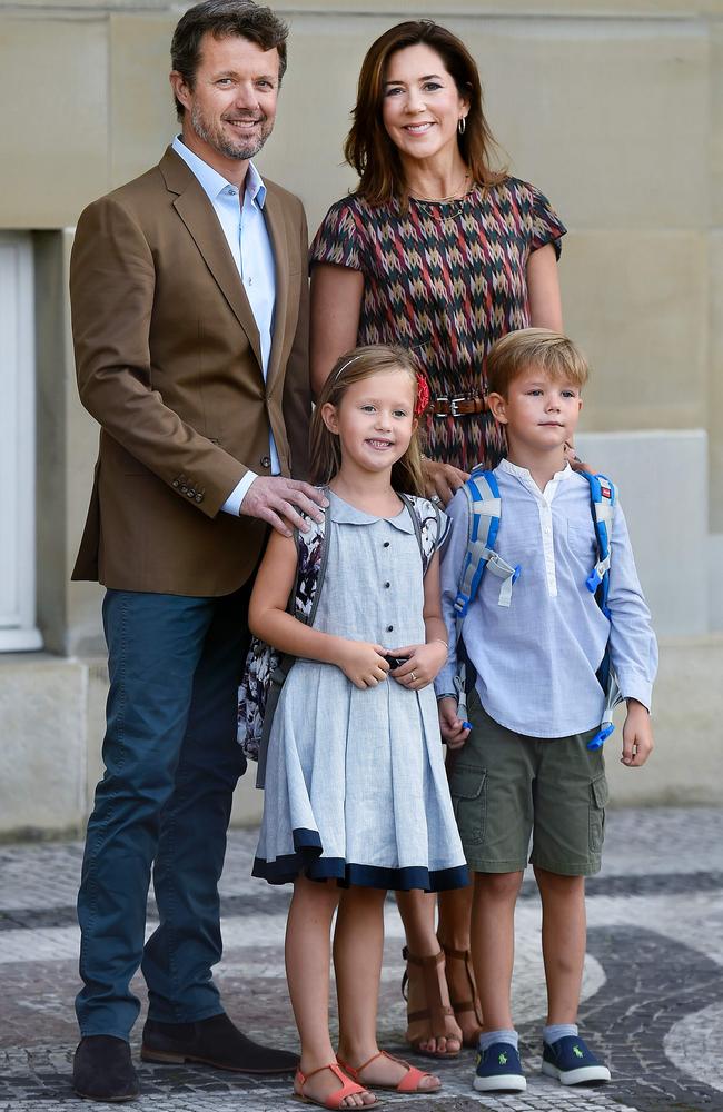 Danish Crown Prince Frederik and Crown Princess Mary with their twins Prince Vincent and Princess Josephine on their first day of school. Picture: AFP