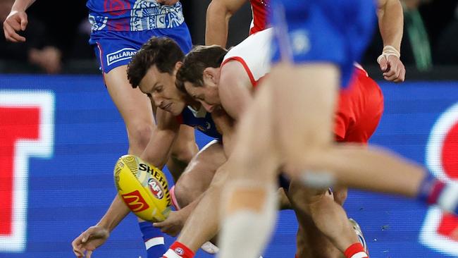 Anthony Scott of the Bulldogs and Harry Cunningham of the Swans collide. (Photo by Michael Willson/AFL Photos via Getty Images)