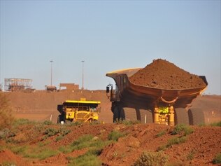 Fortescue Metals is in no rush to offload assets as it steams ahead with cost cuts and debt relief.