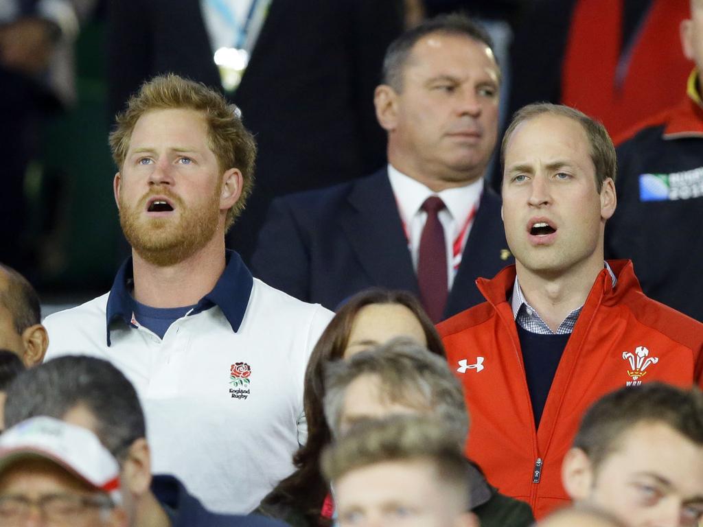 Harry and William have always sat among the crowd at sporting events. Picture: AP