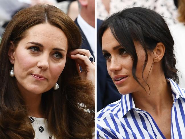 LONDON, ENGLAND - JULY 14:  Catherine, Duchess of Cambridge and Meghan, Duchess of Sussex attend day twelve of the Wimbledon Lawn Tennis Championships at All England Lawn Tennis and Croquet Club on July 14, 2018 in London, England.  (Photo by Clive Mason/Getty Images)