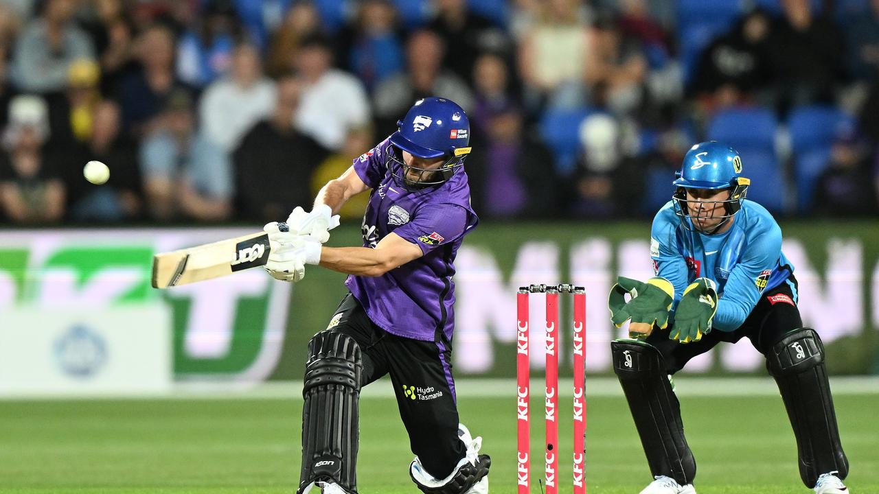 Caleb Jewell of the Hurricanes hits a boundary during the Men's Big Bash League match at Blundstone Arena. (Photo by Steve Bell/Getty Images)