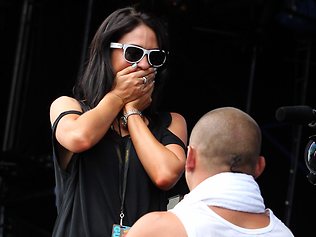 Punters checking out Bliss N Eso's set got a surprise when the group's front man got down on bended knee. Picture: Cameron Richardson