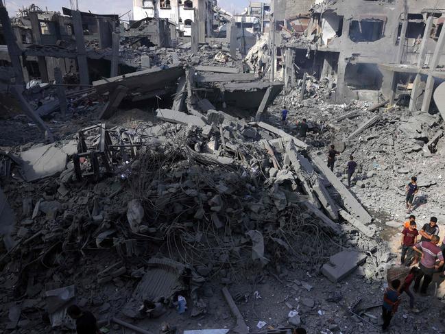 Palestinians check the site of an Israeli strike in Jabalia, in the northern Gaza Strip, on May 14, 2025. Picture: AFP