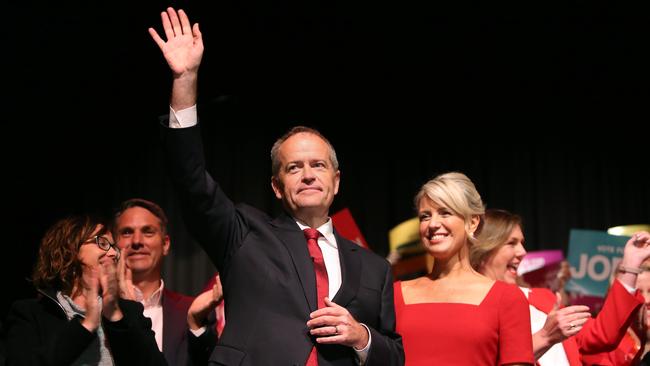 Bill Shorten, with wife Chloe, on stage at the Box Hill rally yesterday. Picture: Kym Smith